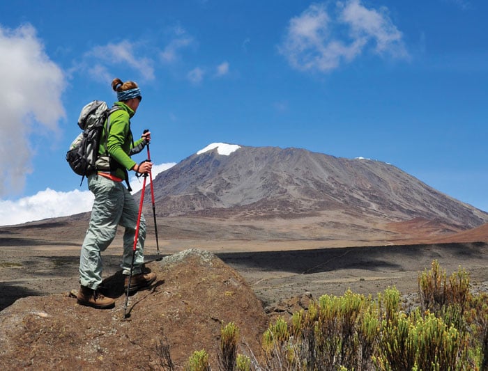 A woman hiking in Mt Kilimanjaro